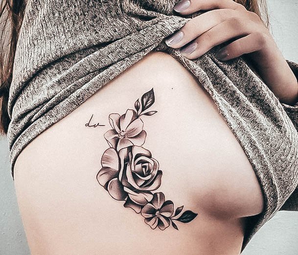 Simplistic Boob Tattoo For Girls