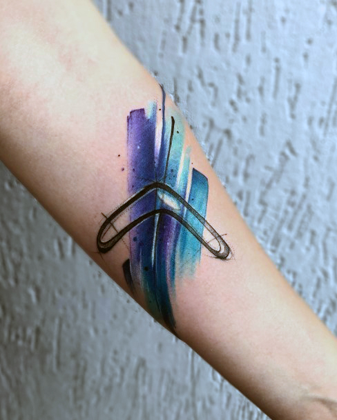 Simplistic Boomerang Tattoo For Girls