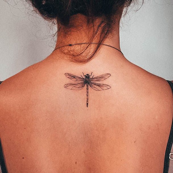 Simplistic Dragonfly Tattoo For Girls
