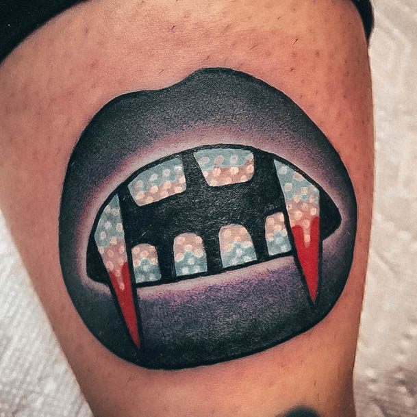 Simplistic Fangs Tattoo For Girls