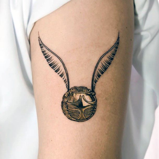 Simplistic Golden Snitch Tattoo For Girls