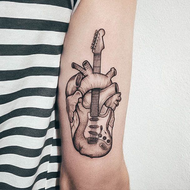 Simplistic Guitar Tattoo For Girls Heart Themed