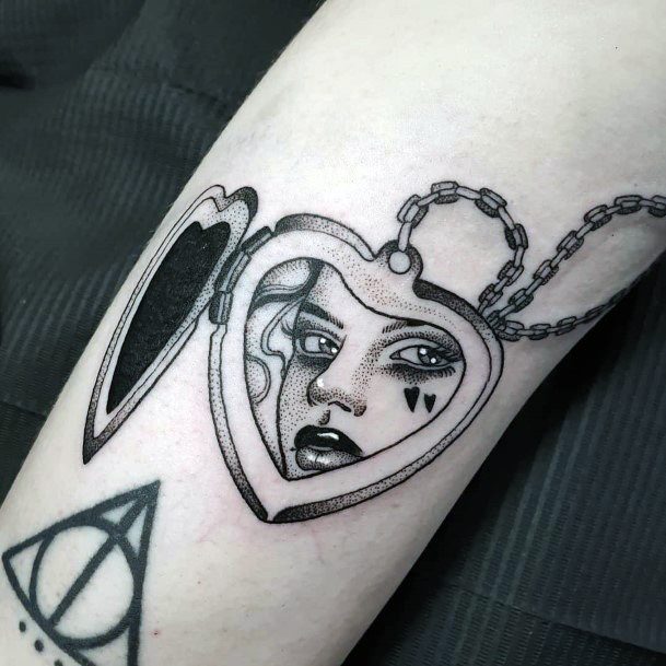 Simplistic Locket Tattoo For Girls