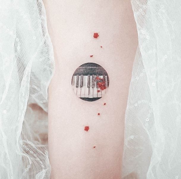 Simplistic Piano Tattoo For Girls