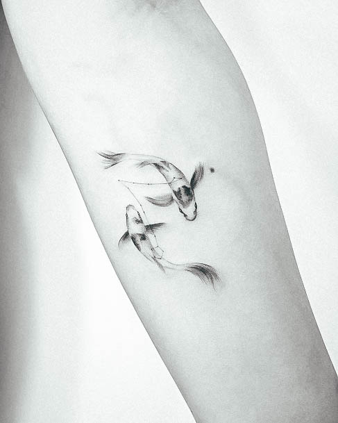Simplistic Pisces Tattoo For Girls