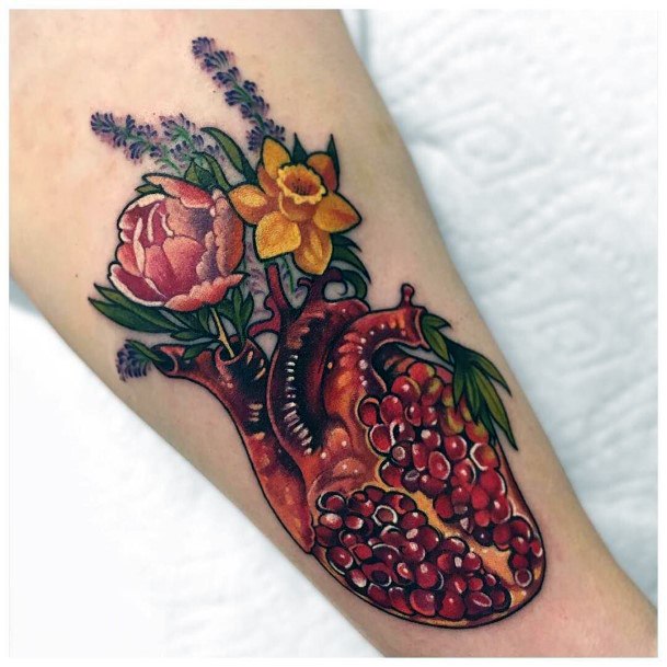 Simplistic Pomegranate Tattoo For Girls