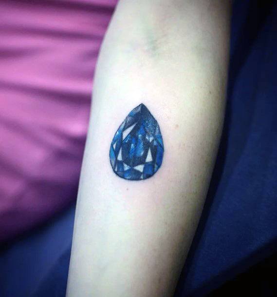 Simplistic Sapphire Tattoo For Girls