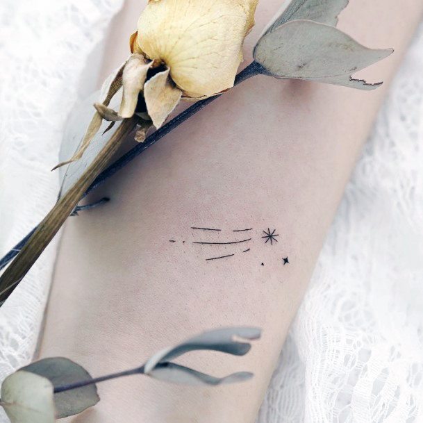 Simplistic Shooting Star Tattoo For Girls