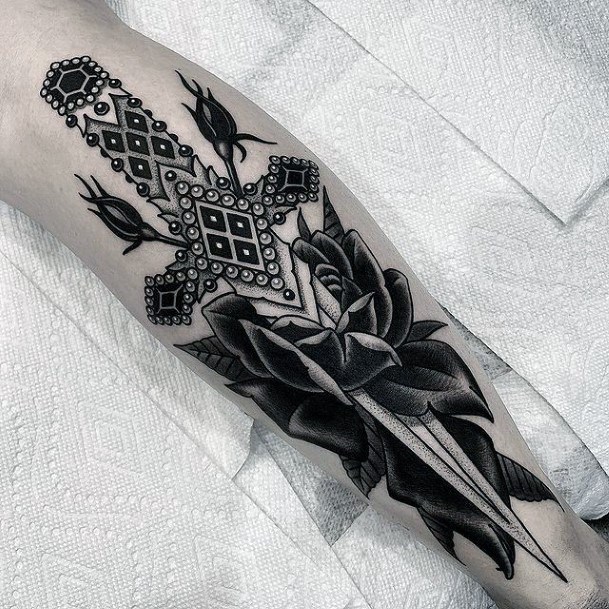 Simplistic Sword Tattoo For Girls