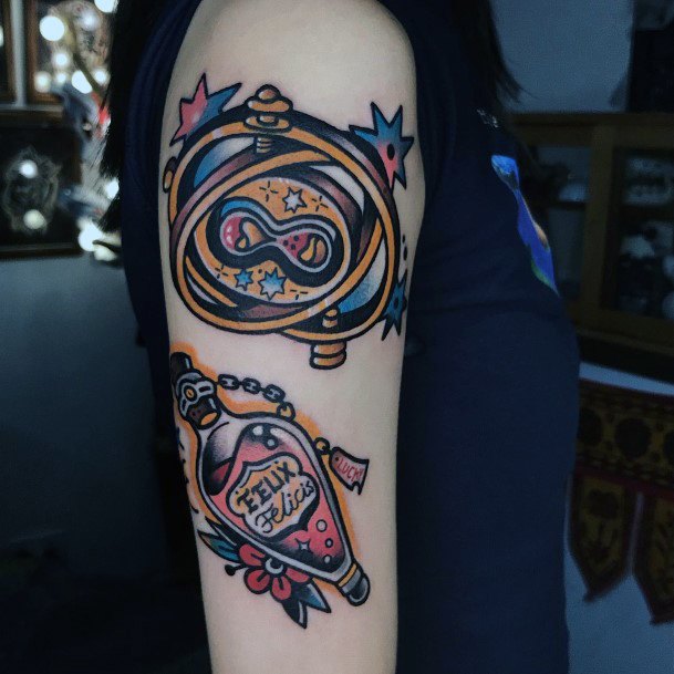 Simplistic Time Turner Tattoo For Girls