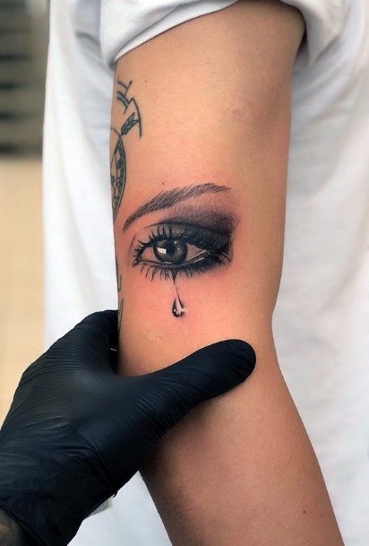 Single Tear Eye Tattoo For Women On Arms