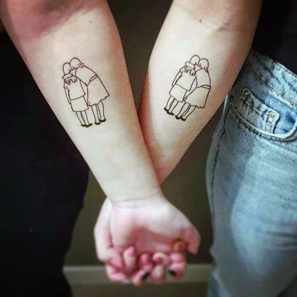 Sisters Hug Tattoo Womens Forearms