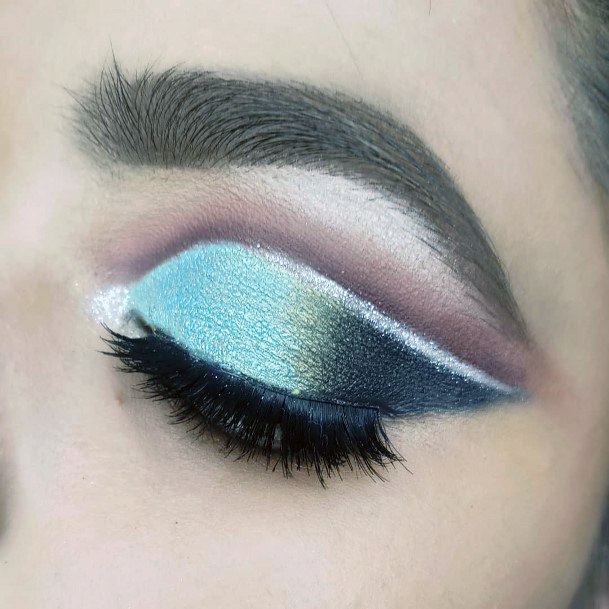 Sleek Blue Eyeshadow With Black Mascara Women