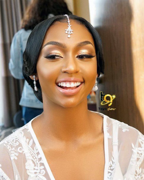 Sleek Center Parted Wedding Hairstyle For Black Women