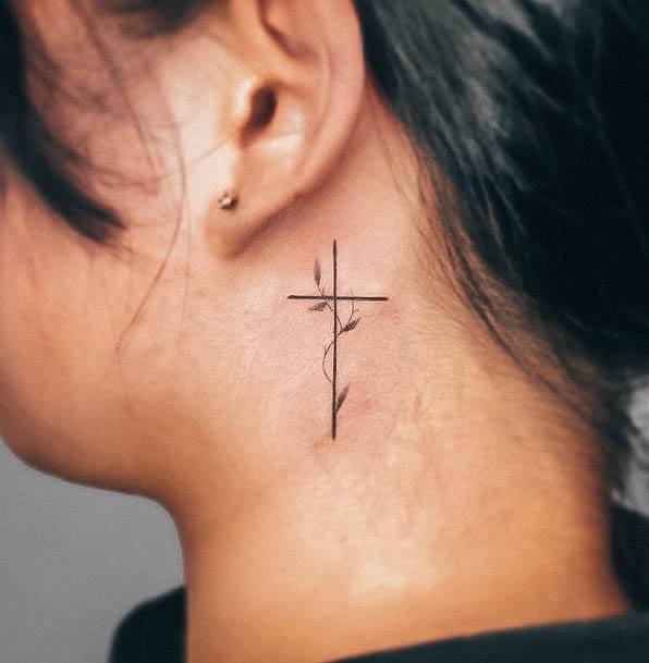 Small Cross Female Tattoo Designs