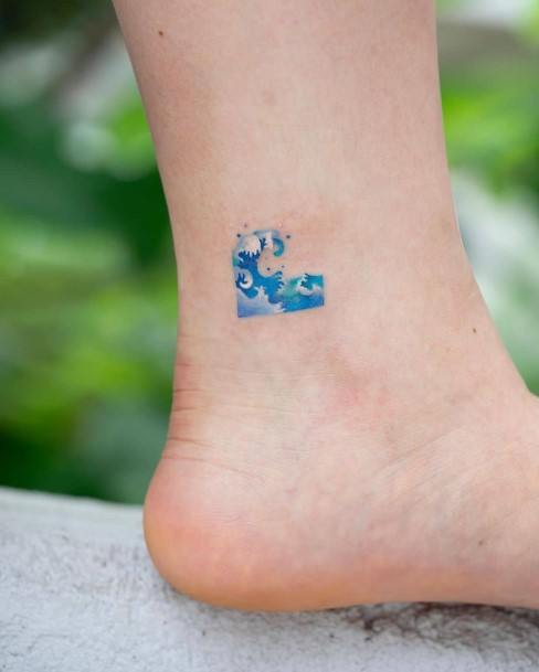 Small Frothy White And Blue Waves Art Tattoo Womens Ankles