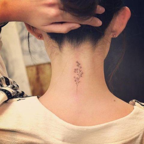 Small Light Plant Tattoo Womens Back Of Neck