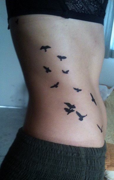 Smattering Of Birds Tattoo Womens Torso