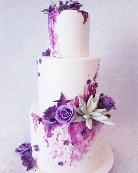 Smooth White Wedding Cake With Purple Flowers