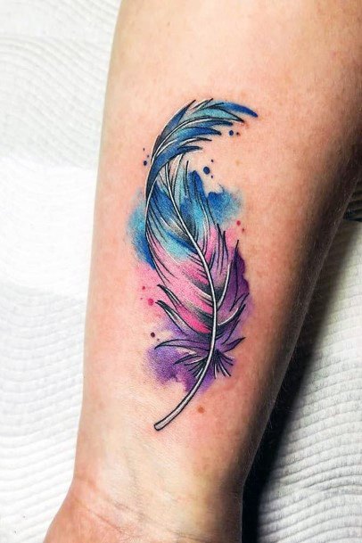 Smudged Blue And Pink Feather Tattoo Women