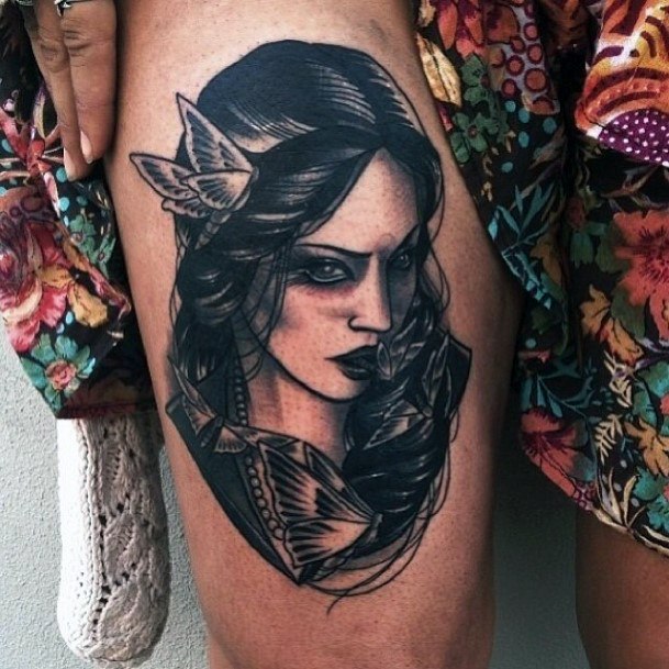 Sombre Women Tattoo On Thighs