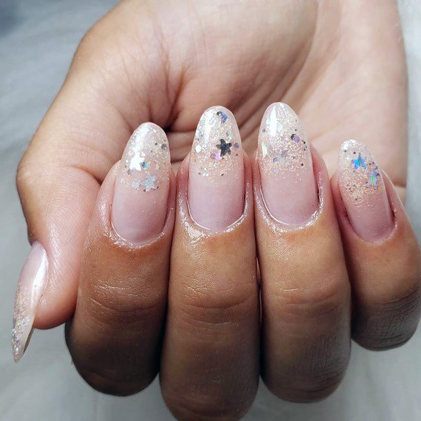 Sparkles On Almond Shaped Pink Nails