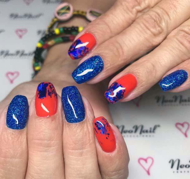 Sparkly Navy Blue And Orange Nails For Women