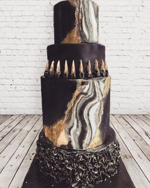 Spikey Black Wedding Cake With Golden Wave