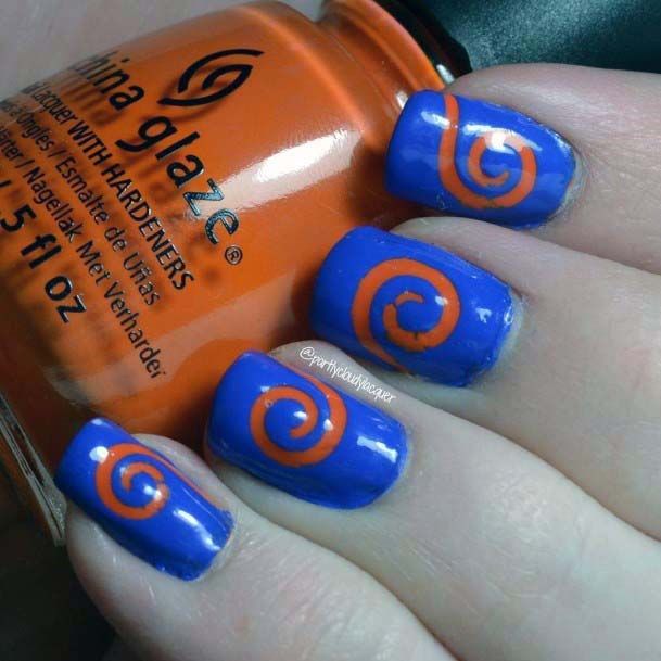 Spiral Orange Design On Blue Nails For Women