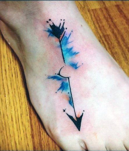 Sprayed Blue Paint Arrow Tattoo Womens Feet