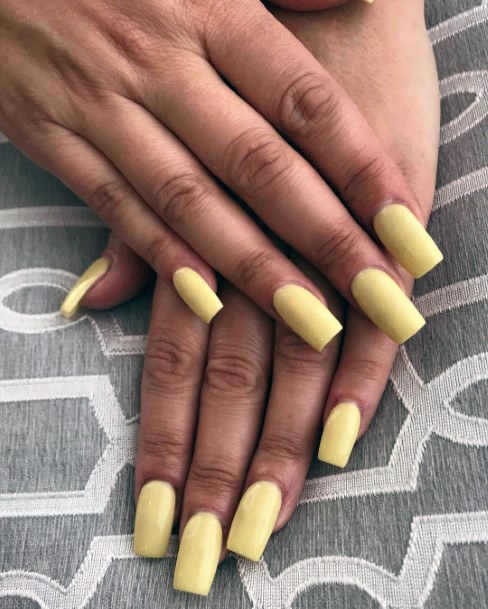 Squaoval Shaped Pale Yellow Nails For Women