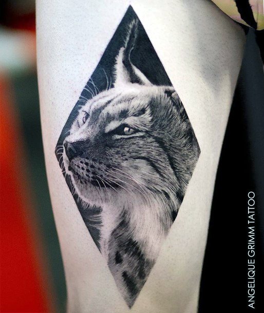 Squinting Eyed Cat In Diamond Frame Tattoo For Women