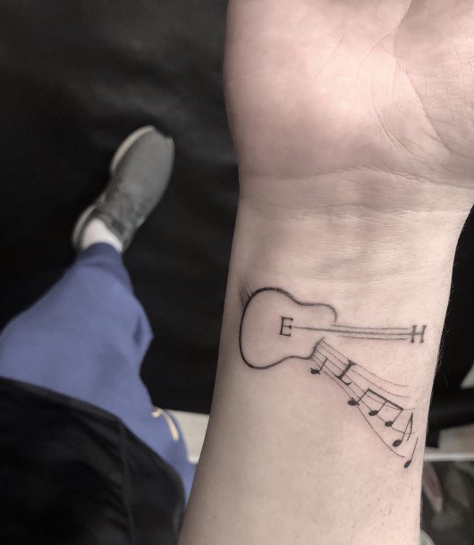 Stellar Body Art Tattoo For Girls Music Note