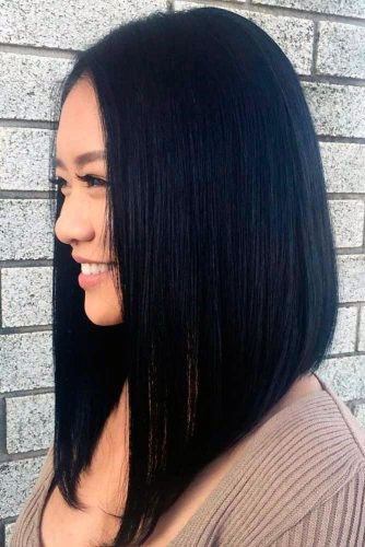 Straight Black Symmetrical Cut Hairstyle For Women