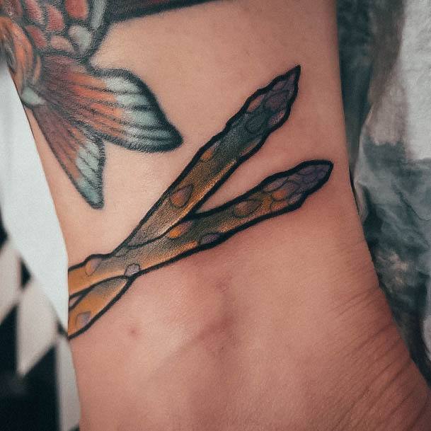 Stunning Asparagus Tattoo On Lady