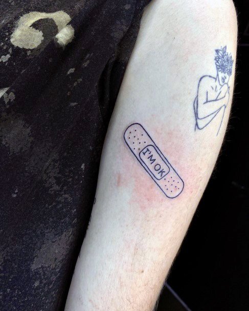 Stunning Bandaid Tattoo On Lady