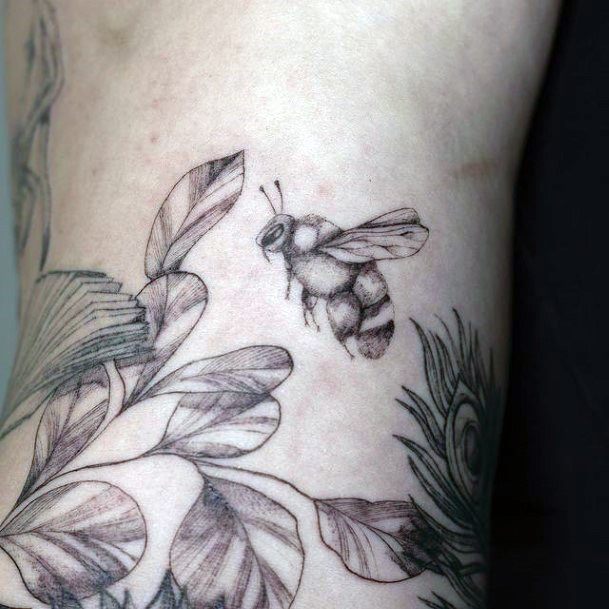 Stunning Bee Tattoo On Lady