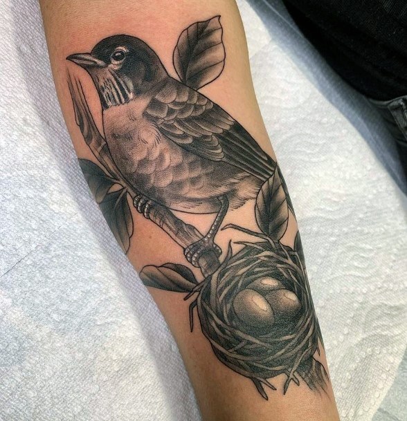 Stunning Birds Nest Tattoo On Lady