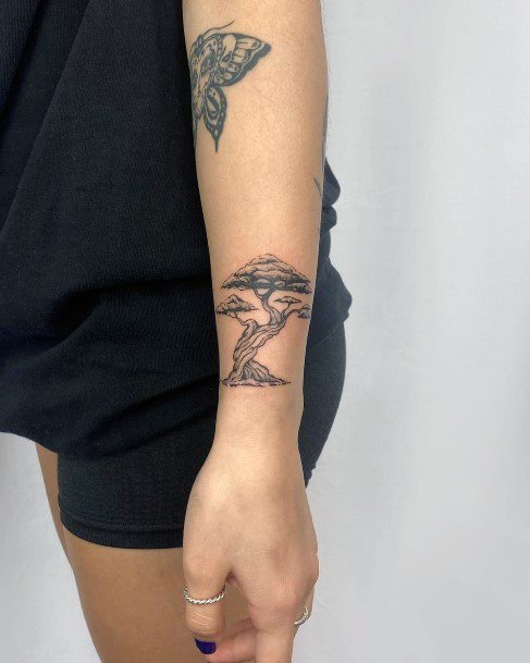 Stunning Bonsai Tattoo On Lady