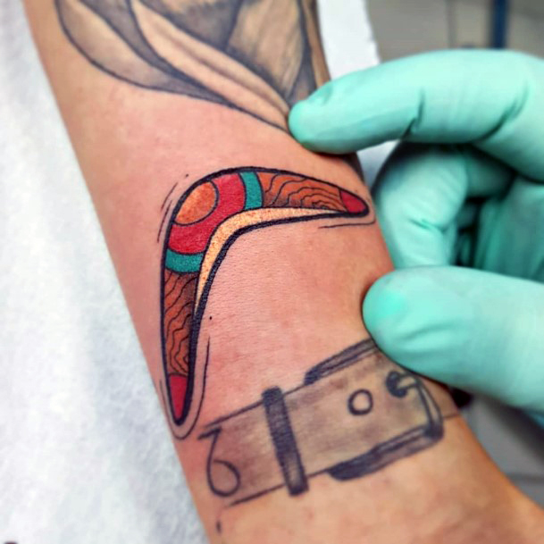 Stunning Boomerang Tattoo On Lady