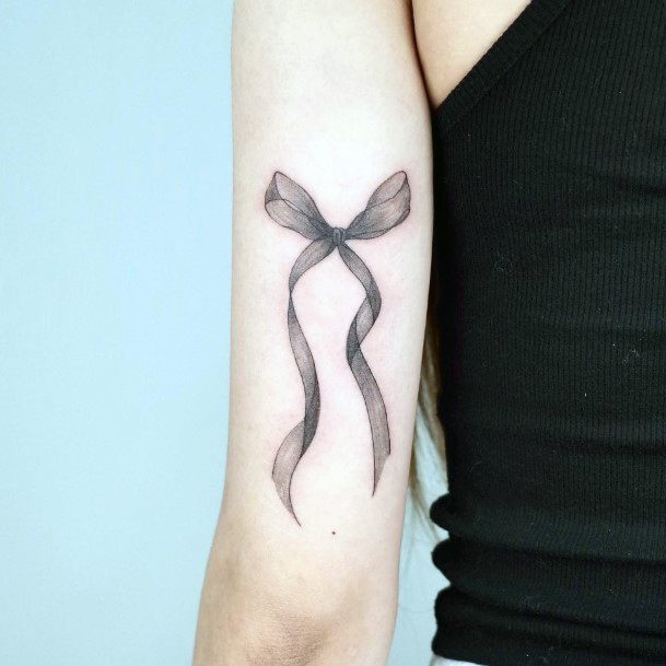 Stunning Bow Tattoo On Lady