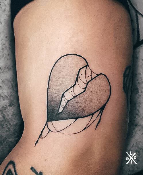 Stunning Broken Heart Tattoo On Lady