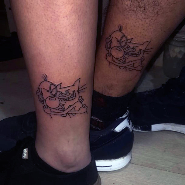 Stunning Catdog Tattoo On Lady