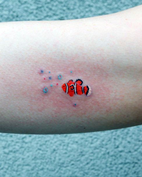 Stunning Clown Fish Tattoo On Lady