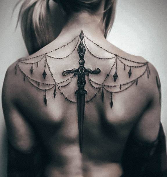 Stunning Dagger Tattoo On Lady