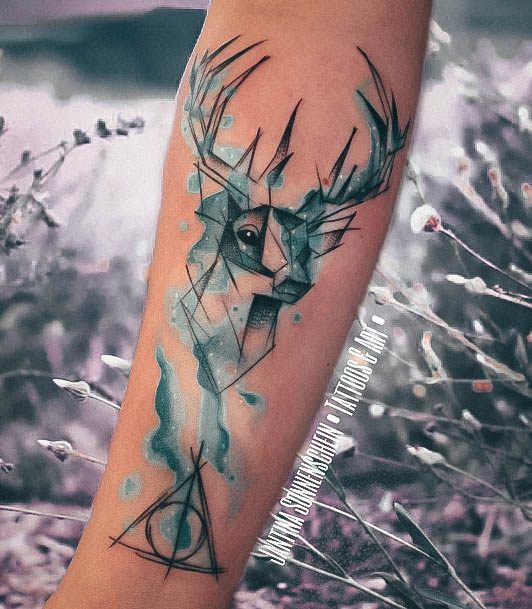 Stunning Deathly Hallows Tattoo On Lady