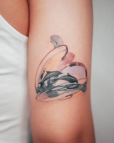 Stunning Dolphin Tattoo On Lady