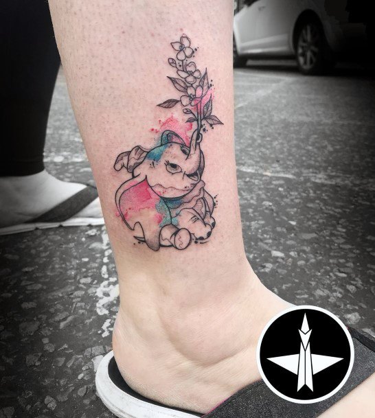 Stunning Dumbo Tattoo On Lady