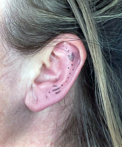 Stunning Ear Tattoo On Lady