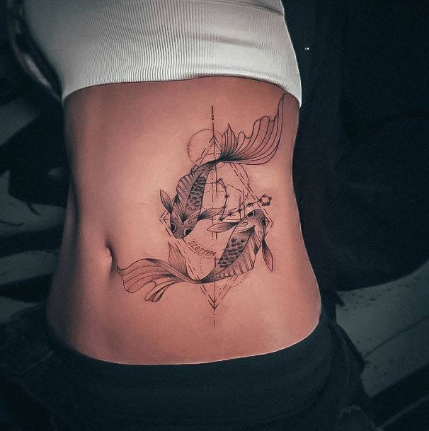 Stunning Fish Tattoo On Lady